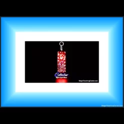Dr. Cyril Thomas's Celestar visual card revelation magic gimmick, integrated into a durable keychain, performing a star-shadow effect to reveal chosen cards.